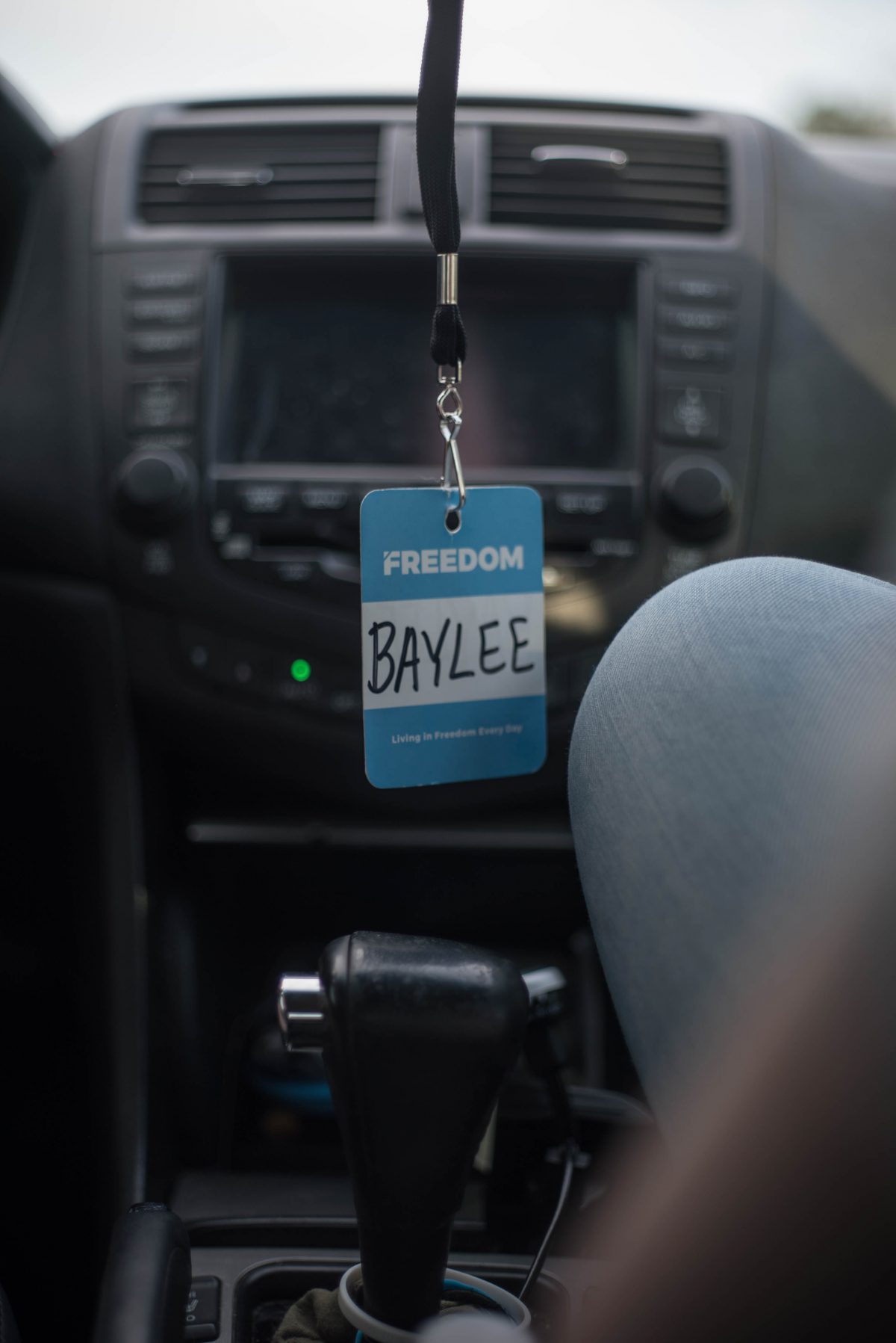 Baylee identification card with blue lanyard